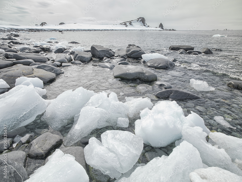 antarctic river flowing to sea