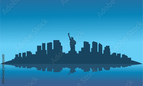 silhouette of liberty on the island