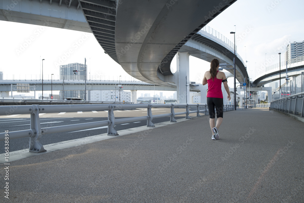 Women are taking a break in the middle of jogging Women are taking a break in the middle of jogging