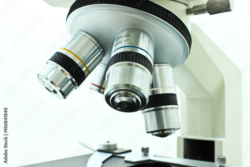 Objective Lens of Microscope Isolated on the White Background Objective Lens of Microscope Isolated on the White Background