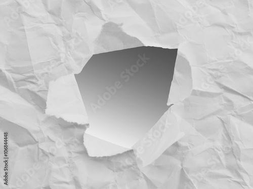 Round hole in paper with white background inside
