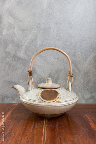 Chinese tea pot on wooden table. Copy space