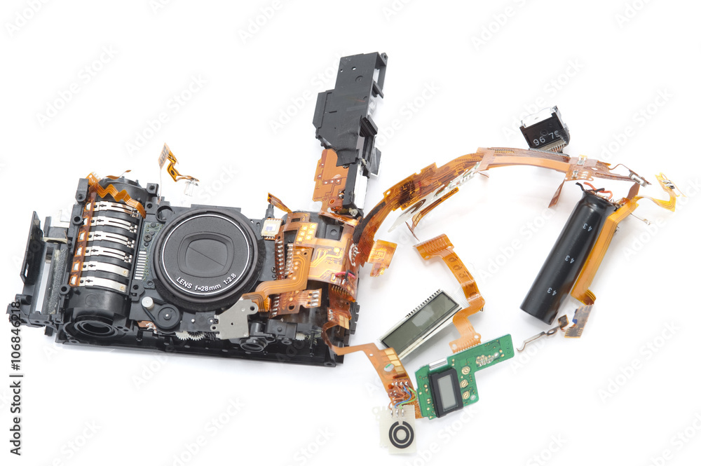 Disassembled digital camera with exposed lens