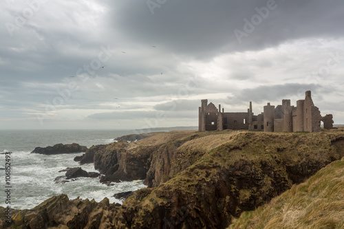 Scenery of ruin castle on coastline, Scotland, United Kingdom