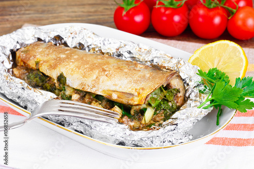 Mackerel Stuffed with Celery and Parsley in a Sauce of Coconut M