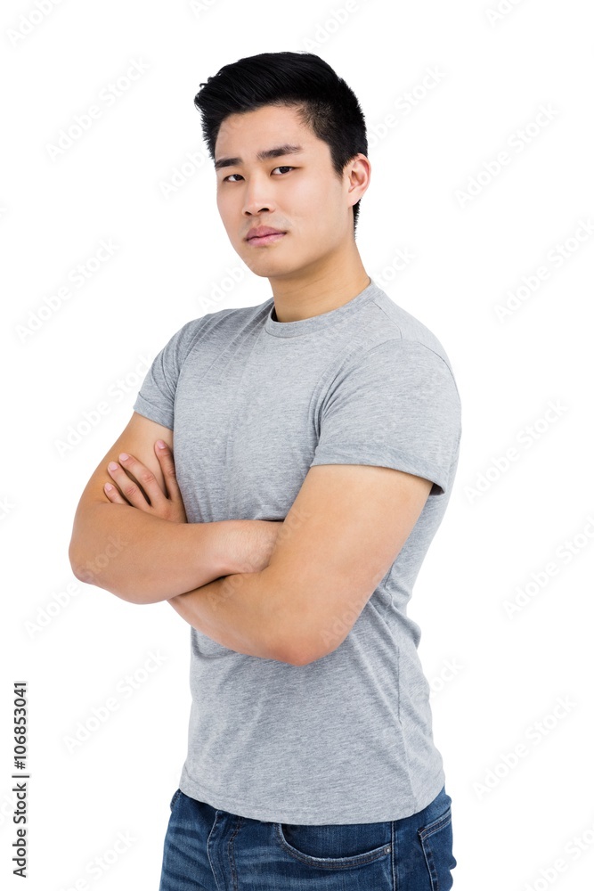 Man standing with arms crossed Man standing with arms crossed