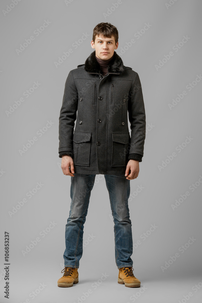 handsome man in a coat handsome man in a coat