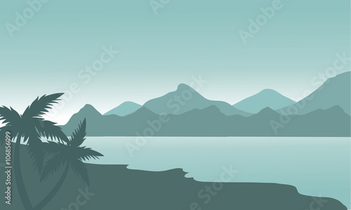 Silhouette of beach and mountain