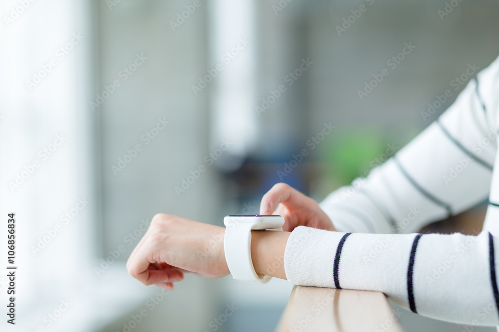 Woman use of wearable smartwatch