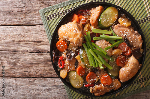 Korean food jjimdak: Stewed chicken with vegetables. Horizontal top view
