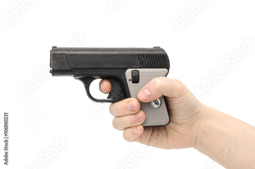 small pistol in female hand