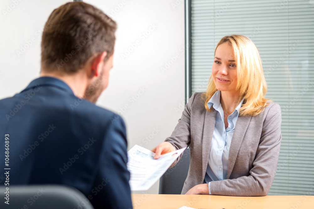 Young attractive woman during job interview Young attractive woman during job interview