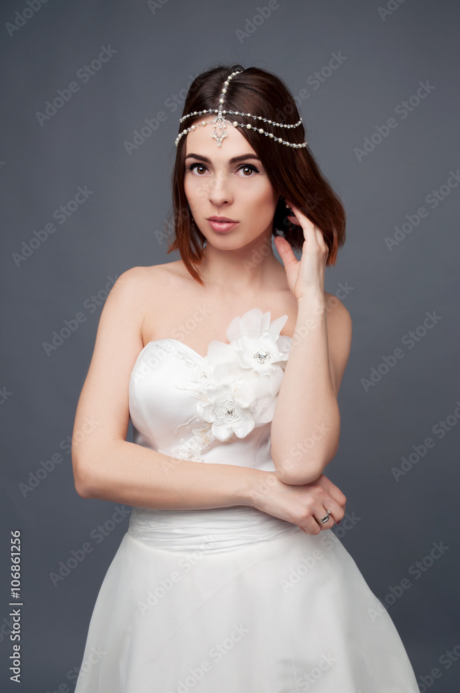 Brunette bride wearing tikka headpiece and white wedding dress Brunette bride wearing tikka headpiece and white wedding dress