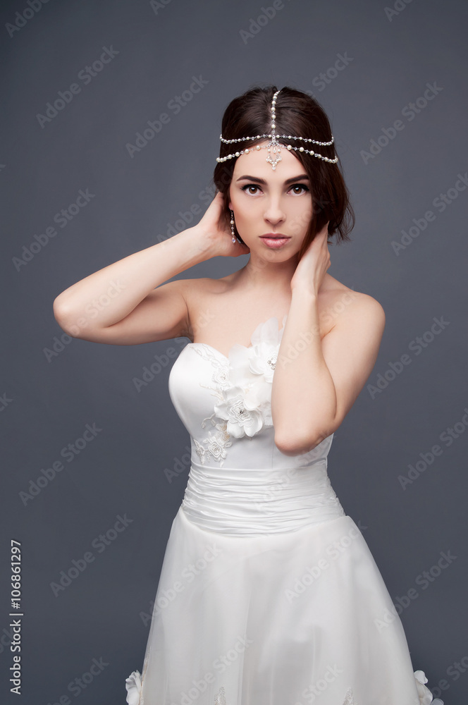 Brunette bride wearing tikka headpiece and white wedding dress Brunette bride wearing tikka headpiece and white wedding dress