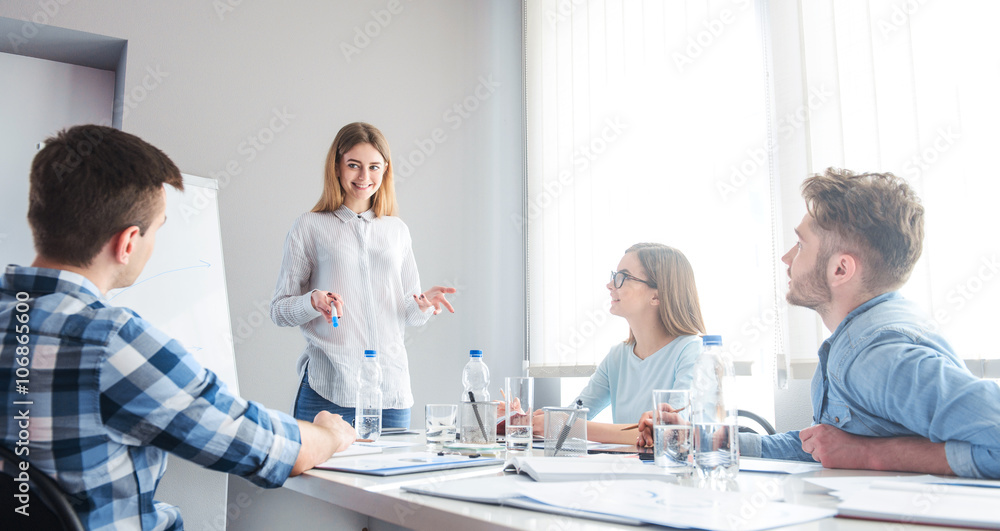 Fototapeta premium Positive colleagues discussing project