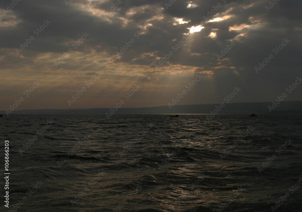 dramatic clouds over the water