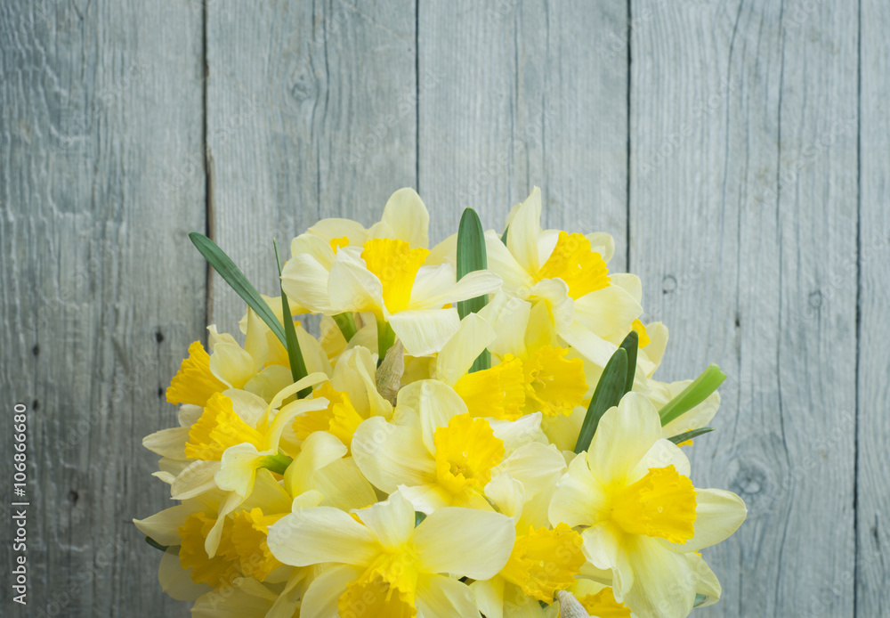 Fototapeta premium still life with a bouquet of narcissuses