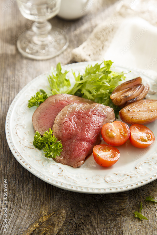 Roast beef with green salad and vegetables Roast beef with green salad and vegetables