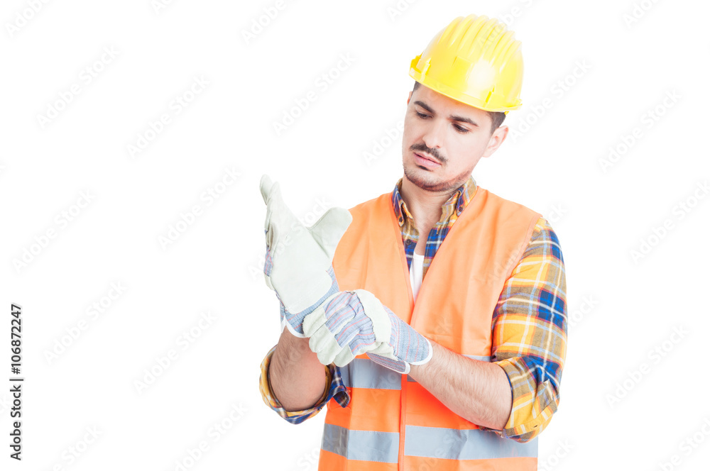 Portrait of attractive engineer in protection equipment putting Portrait of attractive engineer in protection equipment putting