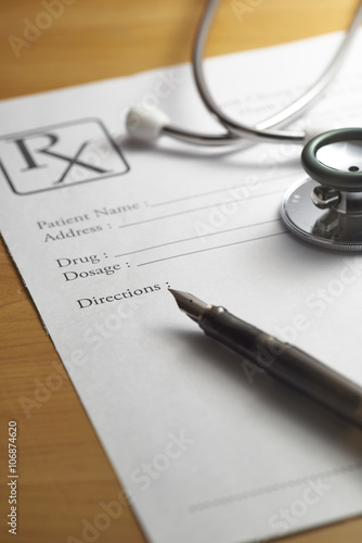 Prescription and stethoscope.