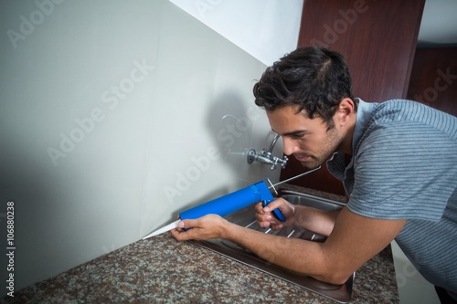 Man using pest control injection  photo