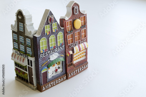 Photography souvenirs from Holland in form of houses facades on a light background