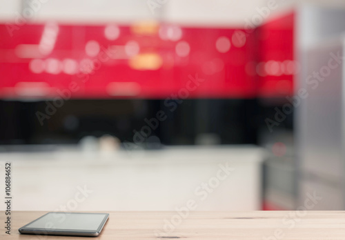 tablet on wooden table