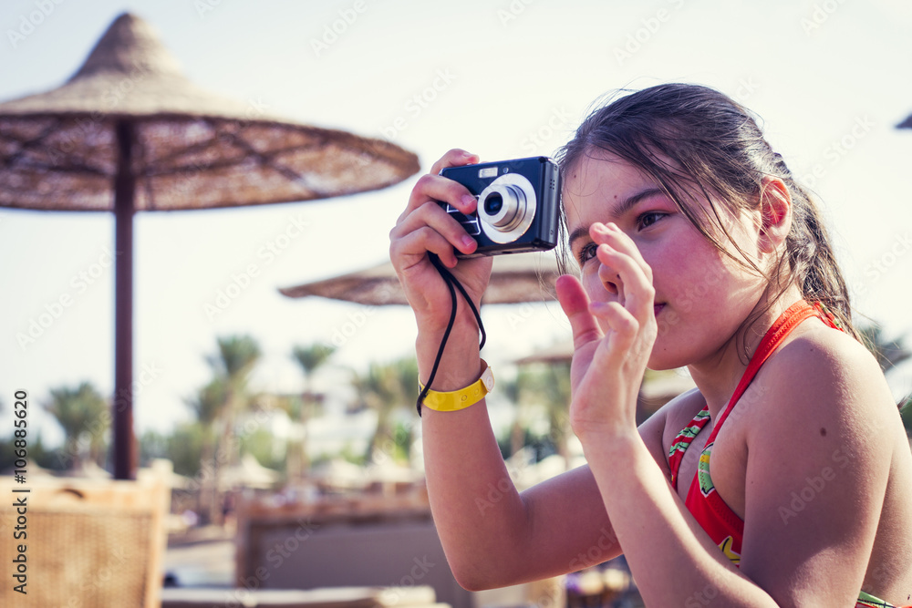 Caucasian girl photographing outdoors Caucasian girl photographing outdoors
