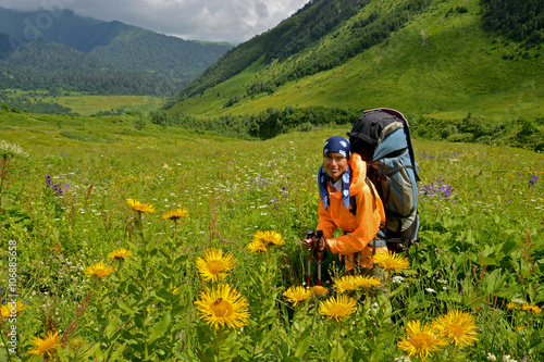 tourist surrounded with flowers