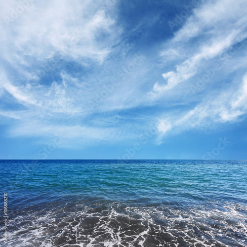 blue sea water and beautiful clouds