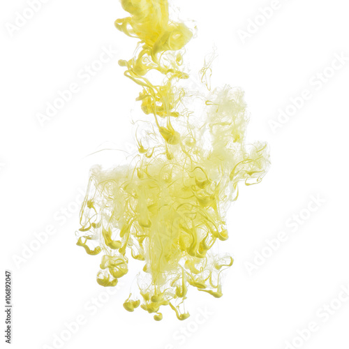 Abstract yellow paint in water