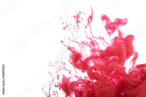 Abstract red paint in water