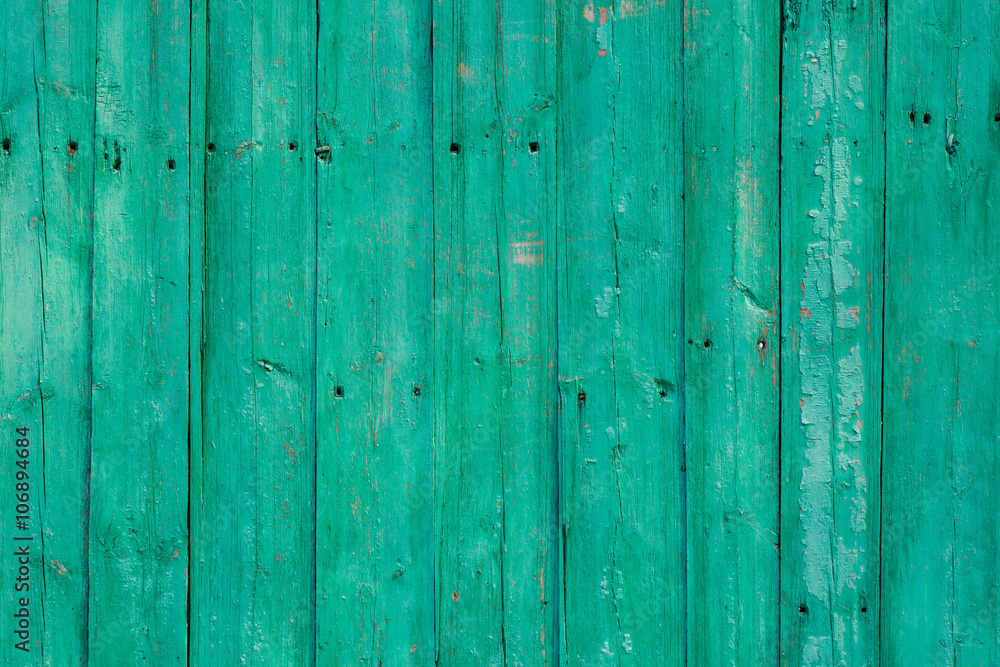 Old green cracked paint on wooden background Old green cracked paint on wooden background