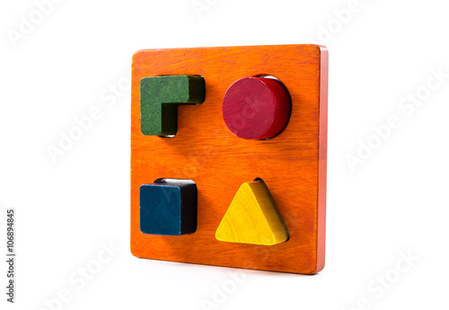 Tableau sur toile wooden blocks shape sorter toy isolated on white background