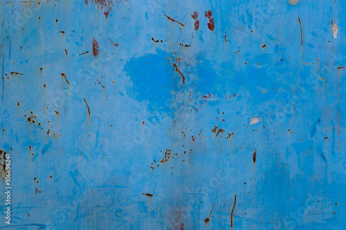 Old blue cracked paint on metal background © kkolosov