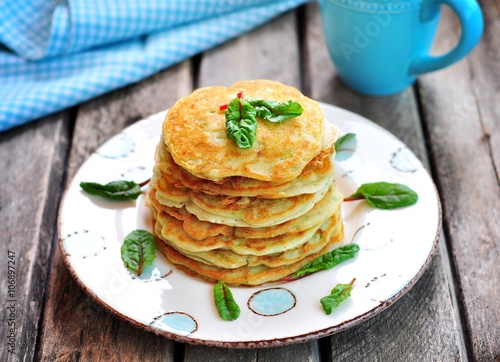 Vegetarian pancakes without eggs and sugar with coconut milk from squash and pumpkin.