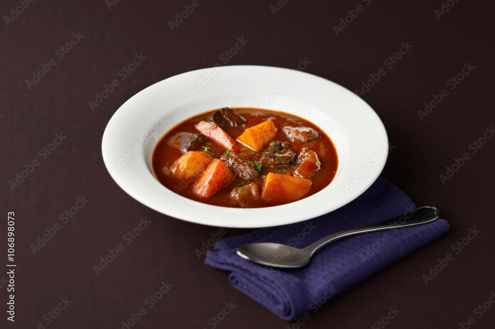 Still life of casserole with meat, potato and carrot Still life of casserole with meat, potato and carrot