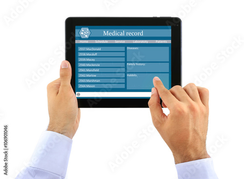 Medical tablet in doctor hands isolated on white