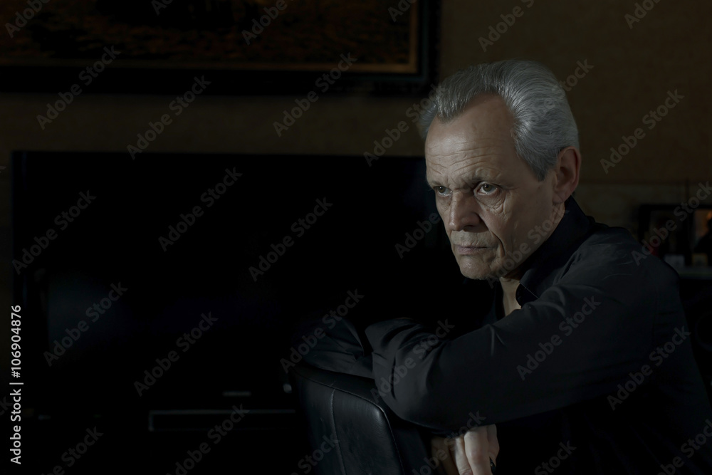 Elderly man - portrait in dark tones Elderly man - portrait in dark tones