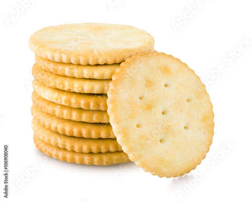 Golden crackers over white background