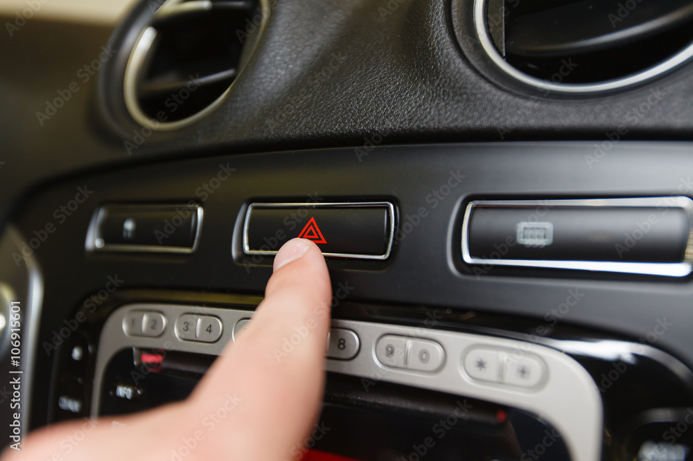 emergency button on car dashboard