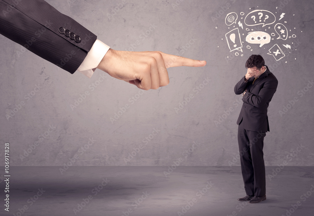 Boss hand pointing at confused employee Boss hand pointing at confused employee