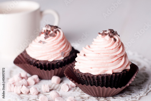 cupcakes on a table with coffee