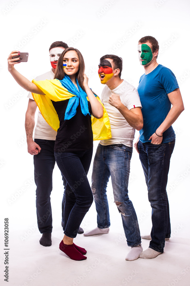 Obraz premium Group of football fans their national team: Ukraine, Germany, Po