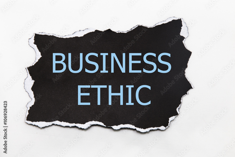 business ethic message written under torn paper business ethic message written under torn paper