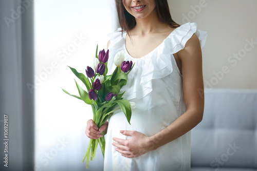 Pregnant woman with beautif...