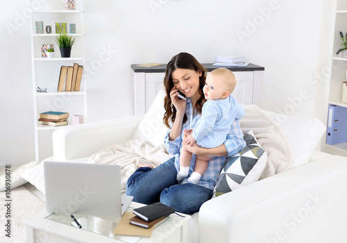 Beautiful woman with baby b...