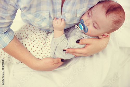 Loving baby with dummy slee...