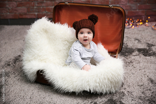 Adorable baby in brown knit...
