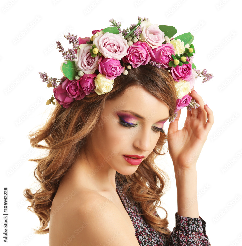 Naklejka premium Beautiful young woman wearing floral headband isolated on white background